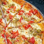 La Tradizione Italiana si Reinventa a Topeka: Nuovi Sapori e la Difesa dell’Autenticità della Pizza
