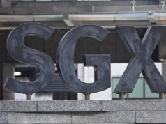 Le azioni di Singapore crollano tra risultati regionali contrastanti